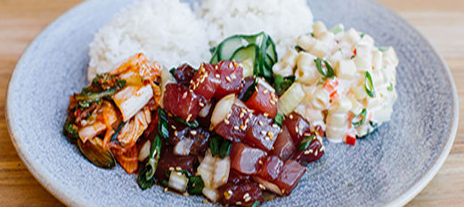 Poke, kimchi, macaroni salad, and rice