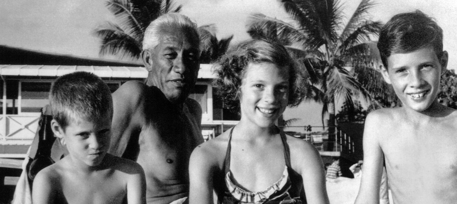 Duke and children at the beach