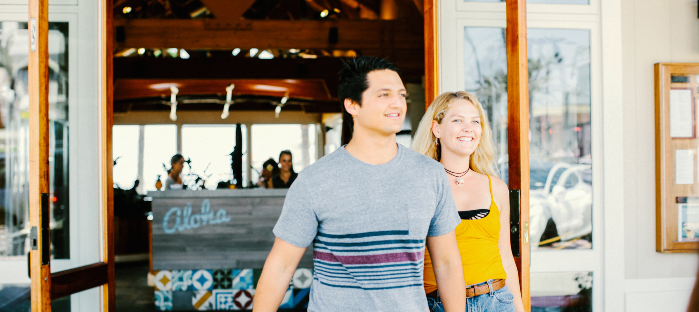 Friends walking out of the restaurant together t