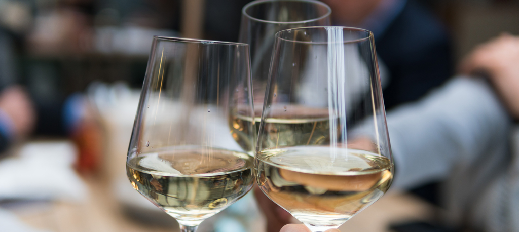 Three glasses of white wine